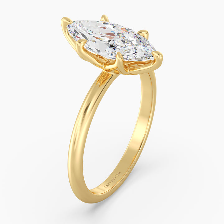 Marquise cut lab grown diamond solitaire ring in 18K yellow gold featuring an IGI certified diamond in a 6-claw prong open basket setting.