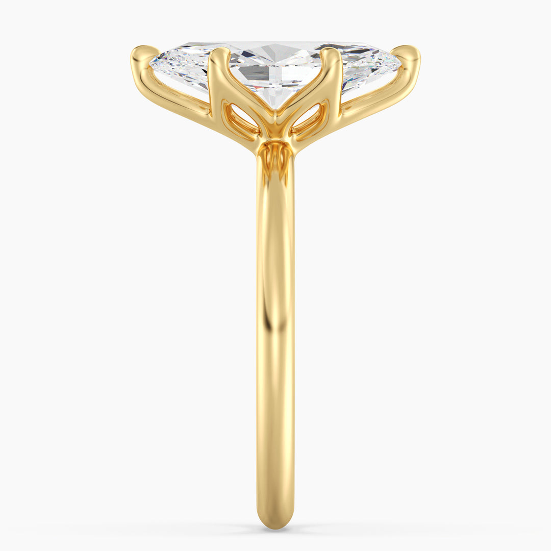 IGI certified marquise cut lab grown diamond solitaire ring in BIS hallmarked 18K yellow gold.