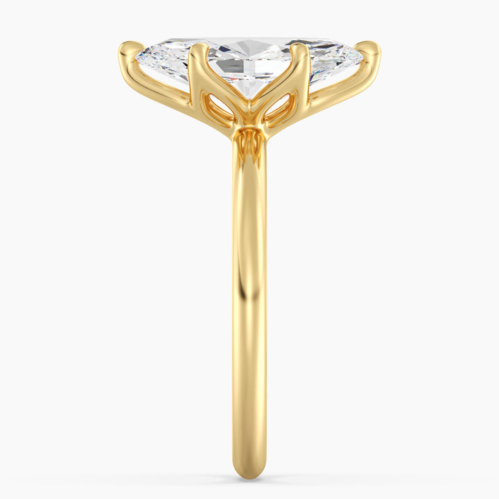 IGI certified marquise cut lab grown diamond solitaire ring in BIS hallmarked 18K yellow gold.
