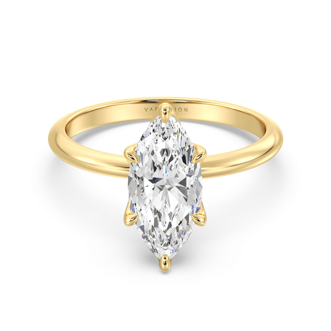 Elegant marquise cut lab grown diamond solitaire ring crafted in 18K yellow gold with exceptional brilliance and a timeless design.