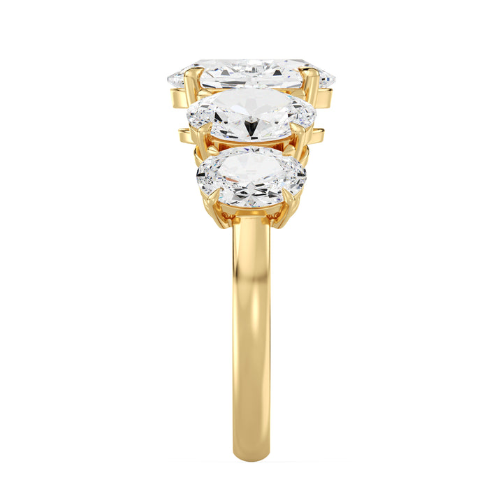 Oval Cut Diamond Milestone Ring with Graduated Side Stones in Yellow Gold