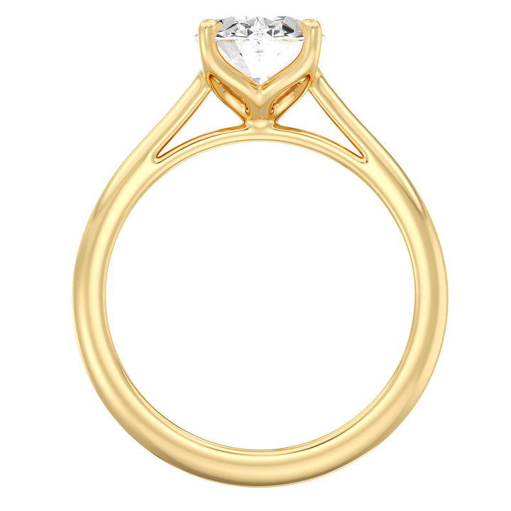 Oval cut lab grown diamond ring in 18K yellow gold showcasing an elongated silhouette and brilliant sparkle.
