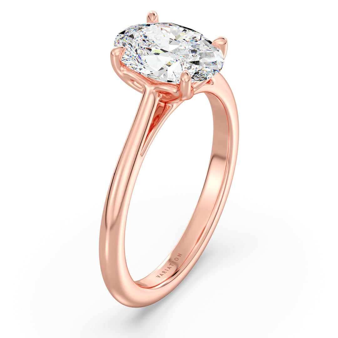 Oval cut lab grown diamond solitaire ring in 18K rose gold featuring an IGI certified diamond with a timeless solitaire design.