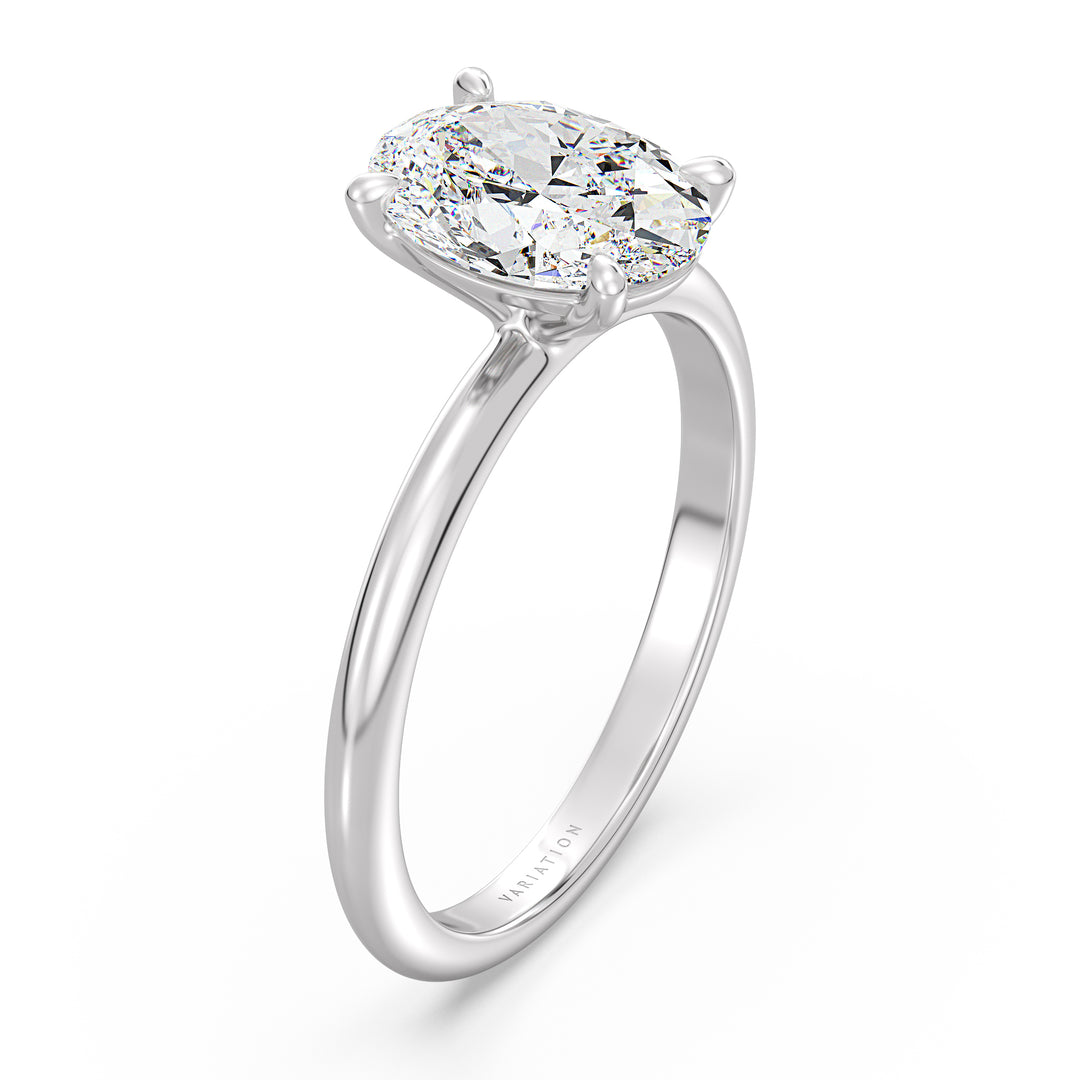 Oval cut lab grown diamond solitaire ring in 18K white gold with a stunning IGI certified diamond and timeless solitaire setting.