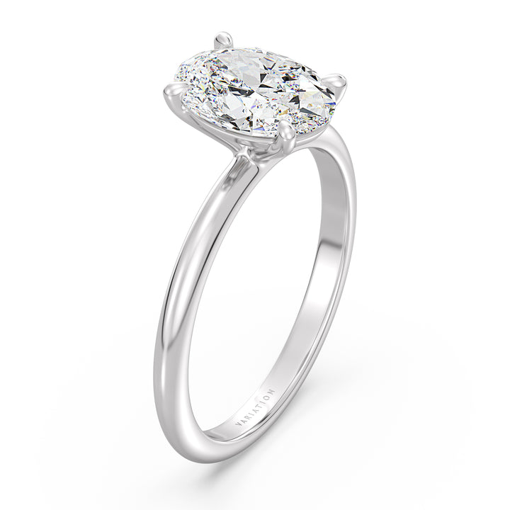 Oval cut lab grown diamond solitaire ring in 18K white gold with a stunning IGI certified diamond and timeless solitaire setting.