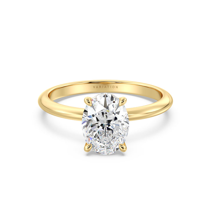 Oval cut lab grown diamond solitaire ring in 18K yellow gold featuring an IGI certified diamond in a classic 4-claw prong setting.
