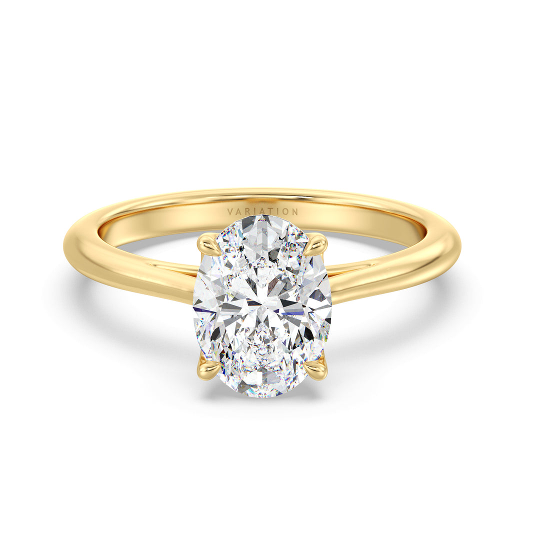 Oval cut lab grown diamond solitaire ring in 18K yellow gold featuring an IGI certified diamond in a classic 4-claw prong setting.