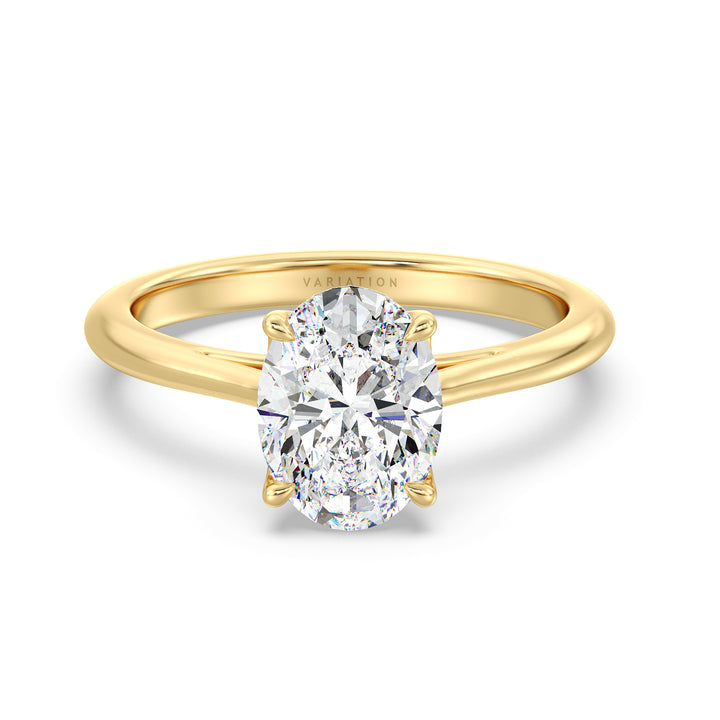 Oval cut lab grown diamond solitaire ring in 18K yellow gold featuring an IGI certified diamond in a classic 4-claw prong setting.