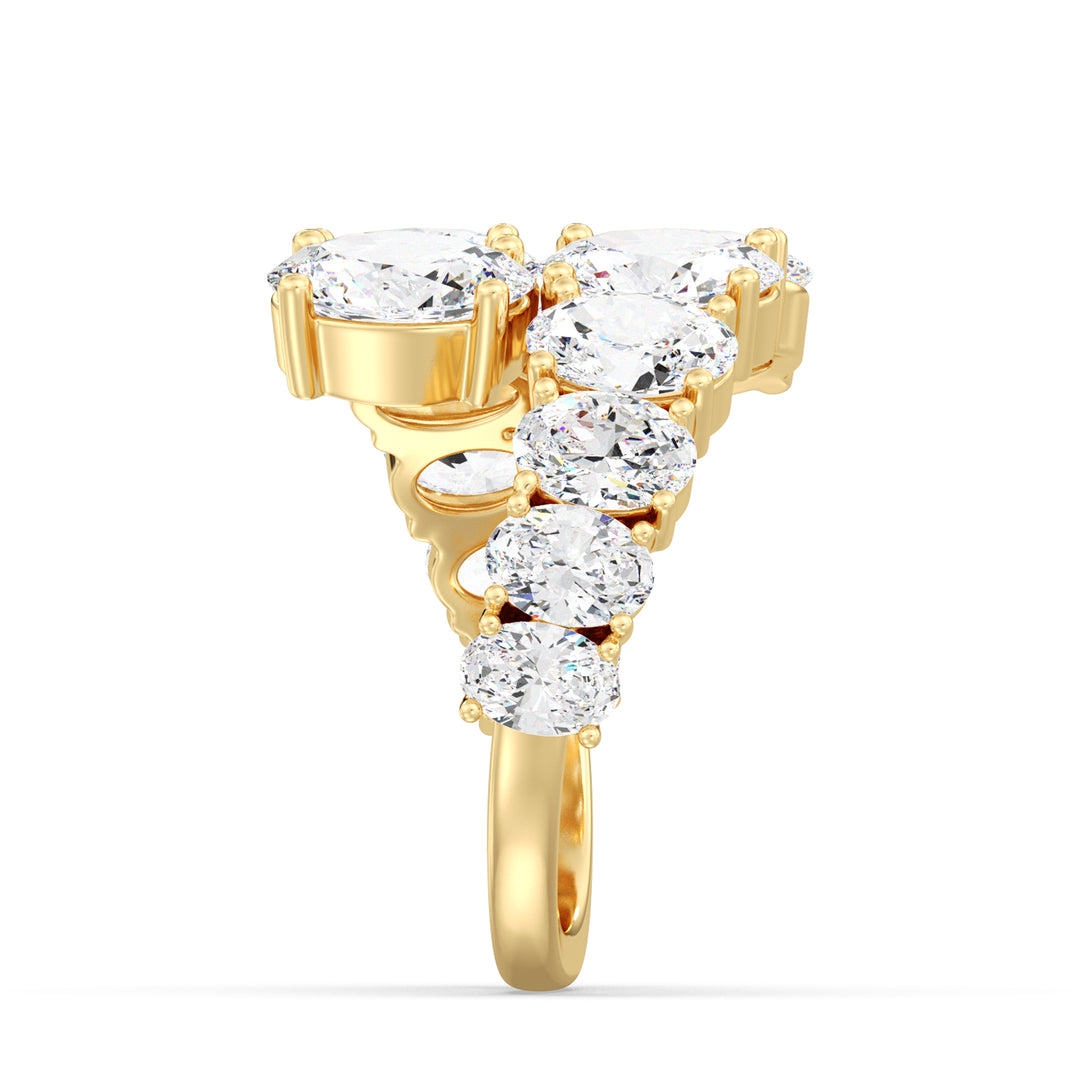 Oval Cut Lab Grown Diamond Statement Ring with Flowing Bypass Design in Yellow Gold