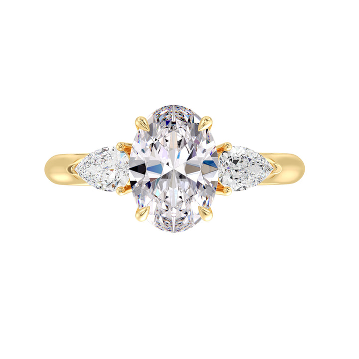 Oval Diamond Ring with Pear Side Stones and Hidden Accents in Yellow Gold