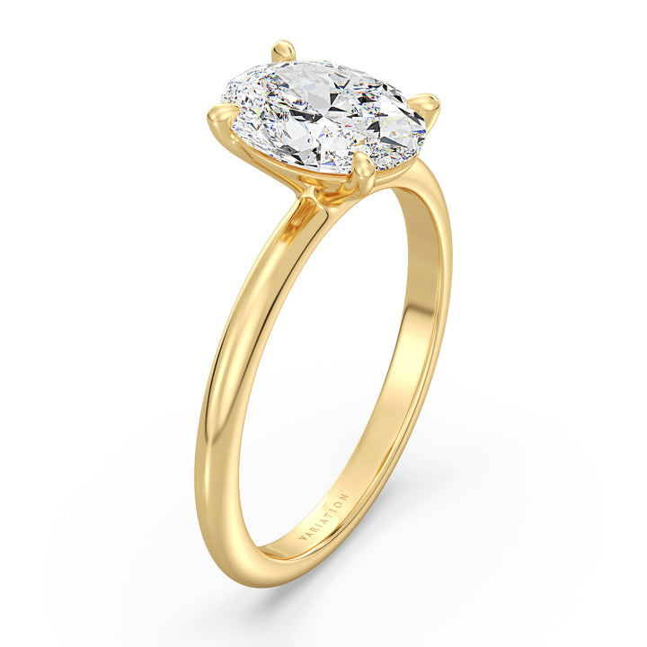 Elegant oval cut lab grown diamond engagement ring crafted in 18K yellow gold with a timeless solitaire design.