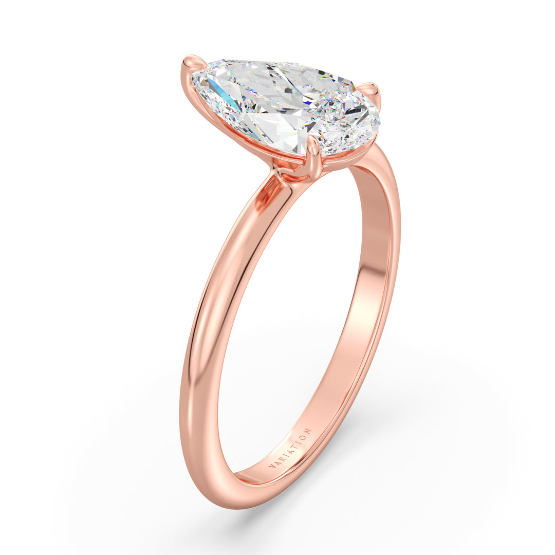 Pear cut lab grown diamond solitaire ring in 18K rose gold featuring an IGI certified diamond with romantic elegance and brilliant sparkle.
