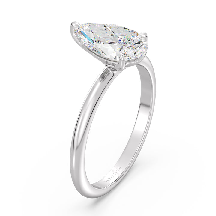 Pear cut lab grown diamond solitaire ring in 18K white gold with a stunning IGI certified diamond and elegant solitaire setting.