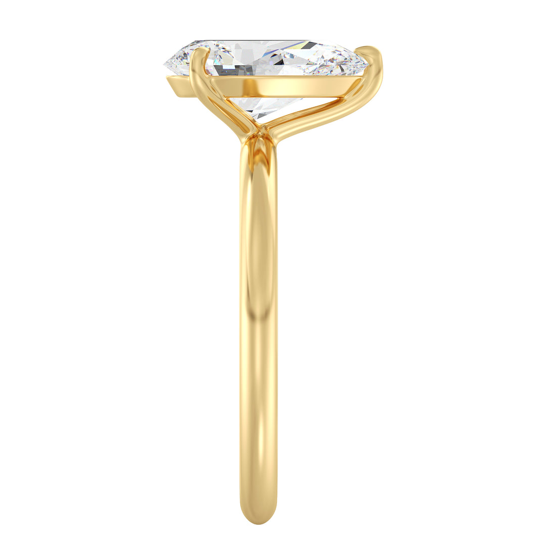 Pear cut lab grown diamond ring in 18K yellow gold showcasing a graceful teardrop silhouette and exceptional brilliance.