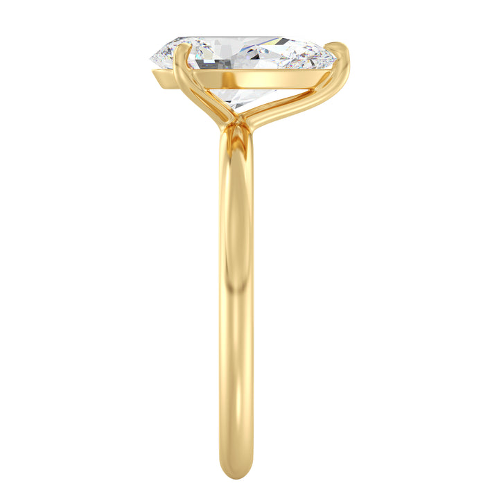 Pear cut lab grown diamond ring in 18K yellow gold showcasing a graceful teardrop silhouette and exceptional brilliance.