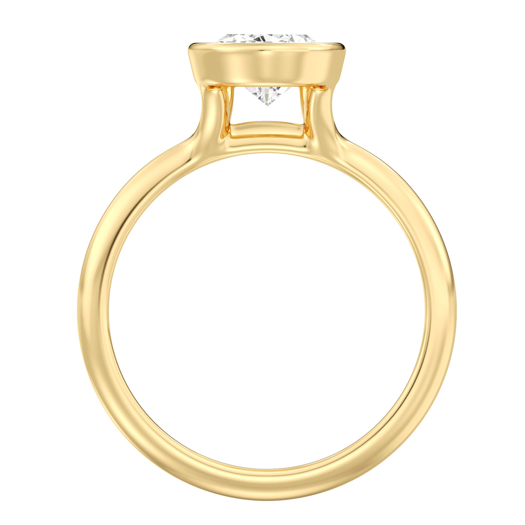 IGI certified pear cut lab grown diamond bezel solitaire ring in BIS hallmarked 18K yellow gold.