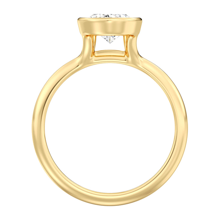 IGI certified pear cut lab grown diamond bezel solitaire ring in BIS hallmarked 18K yellow gold.