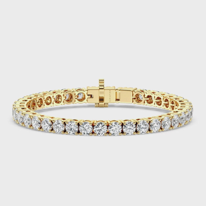 Video showcasing the Elegant Round Lab-Grown Diamond Tennis Bracelet in 18K Yellow Gold, featuring 41 EF/VS diamonds with a total carat weight of 12.30ct, sparkling in a luxurious yellow gold setting.