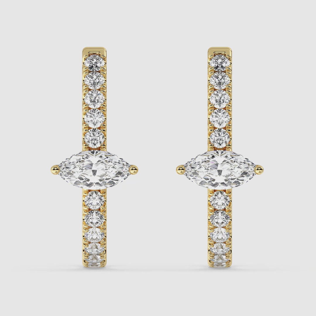 360-degree video showcasing Elegant 18KT Yellow Gold Twist Hoop Earrings adorned with Lab-Grown Diamonds, featuring a sparkling combination of Round and Marquise Cut diamonds totaling 0.73ct