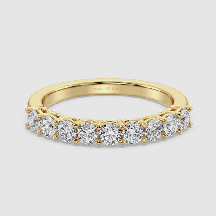 Elegant nio-stenround labbodlad diamantvigger i 18 k fast guld