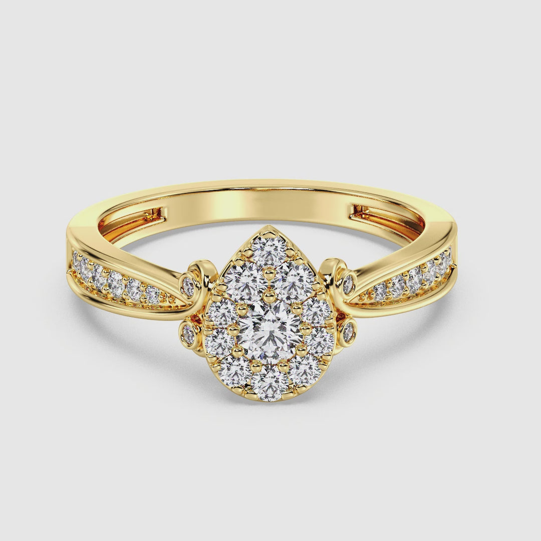 Video showcasing the 18K Yellow Gold Pear Shape Cluster Halo Engagement Ring with 0.70CTTW Round EF-VS Lab-Grown Diamonds, highlighting the ring's intricate design and sparkling diamonds from various angles.