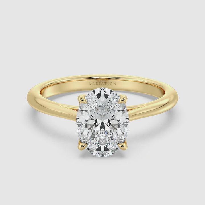 Tidløs oval-skåret lab-dyrket diamantsolitaire-engagementring i 18 k guld med klassisk 4-klov indstilling