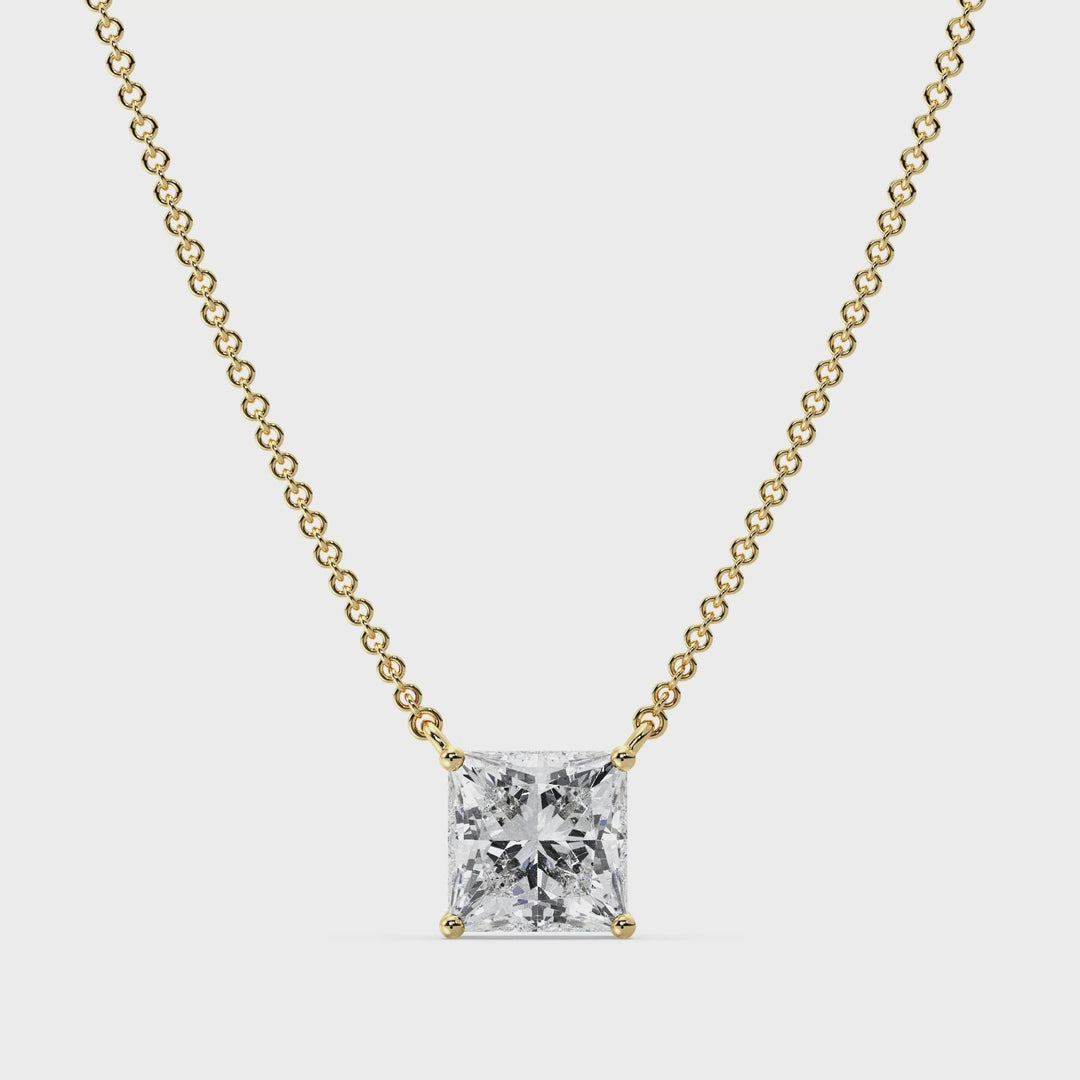 Video showcasing the 2.00 Carat Princess Cut Solitaire Lab-Grown Diamond Pendant Necklace in 18K Yellow Gold, featuring an IGI Certified E/VS Diamond in a prong setting