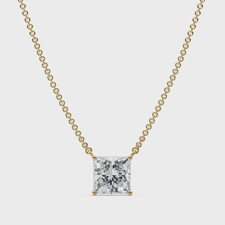 Video showcasing the 2.00 Carat Princess Cut Solitaire Lab-Grown Diamond Pendant Necklace in 18K Yellow Gold, featuring an IGI Certified E/VS Diamond in a prong setting