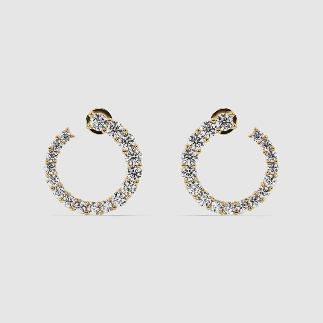 Video showcasing Stylish Graduated Lab-Grown Diamond Open Circle Hoop Earrings in Yellow Gold, highlighting the sparkle of 34 lab-grown diamonds set in luxurious 18K gold. Watch as the elegant design and sophisticated craftsmanship come to life, perfect for any occasion.