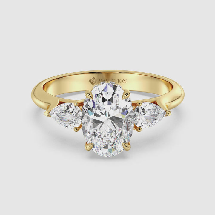 Oval Cut Lab Grown Diamond Three Stone Ring with Pear Side Diamonds Video