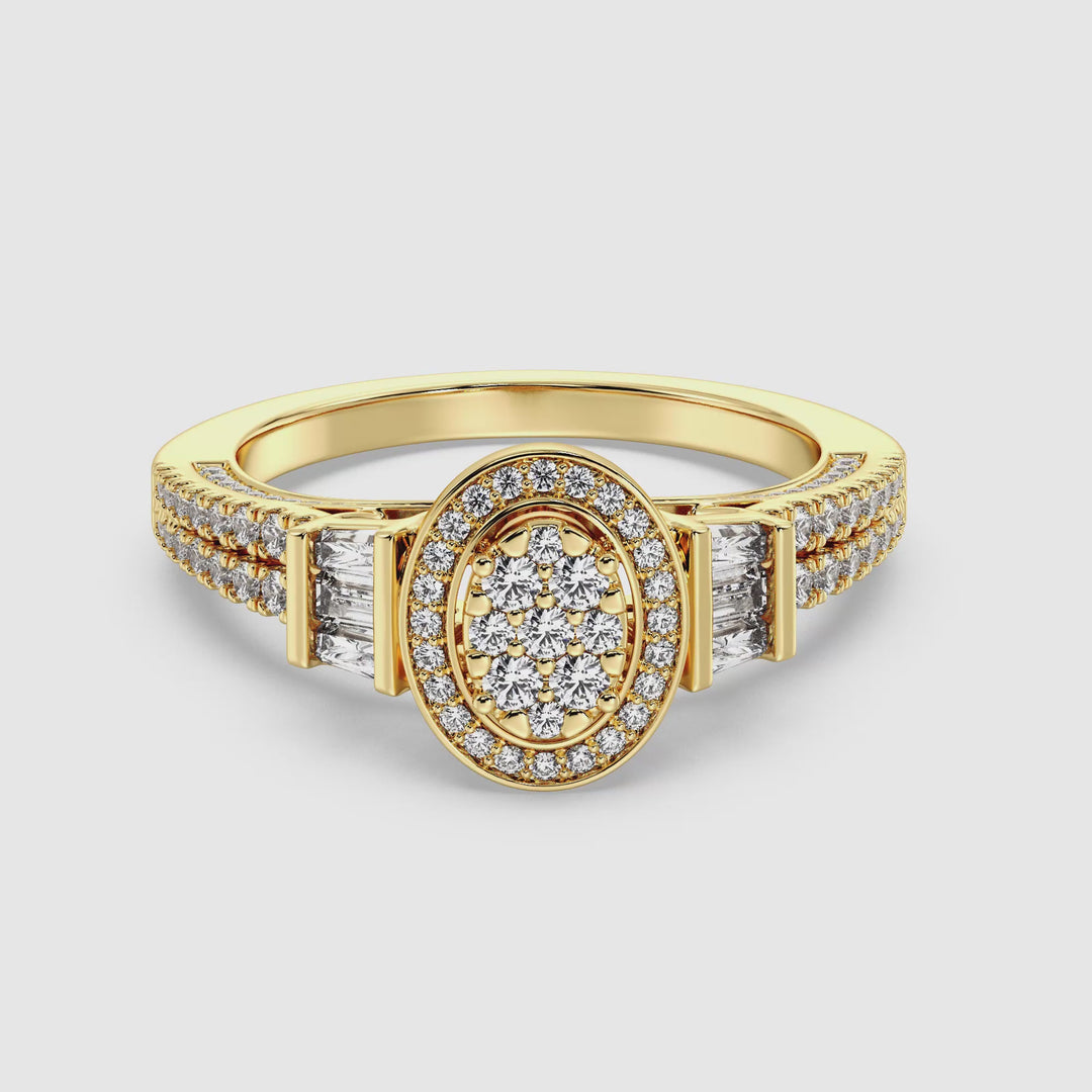 Close-up video of a 0.96 CTW Oval Halo Engagement Ring with Round and Tapered Baguette EF-VS Lab-Grown Diamonds set in Yellow Gold. The video highlights the ring's intricate design, sparkling diamonds, and the warm, luxurious tone of the yellow gold setting