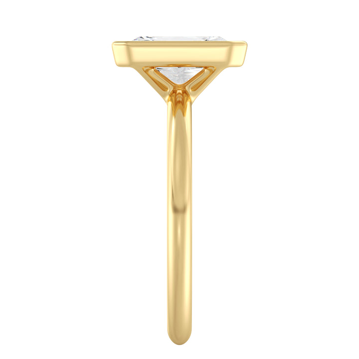 Radiant cut lab grown diamond ring in 18K yellow gold showcasing exceptional brilliance, trimmed corners, and a secure bezel setting.