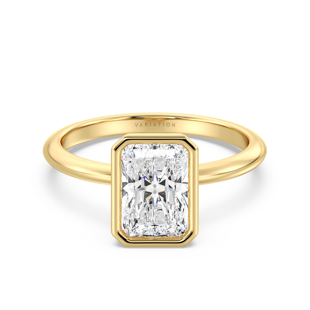 Radiant cut lab grown diamond bezel solitaire ring in 18K yellow gold featuring an IGI certified diamond with a modern bezel setting.