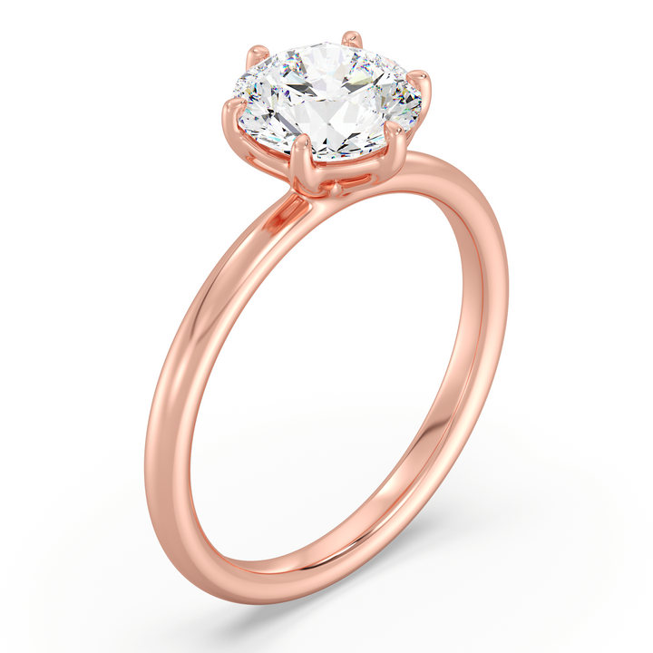 Round brilliant cut lab grown diamond solitaire ring in 18K rose gold featuring an IGI certified diamond with a timeless 6-prong setting.
