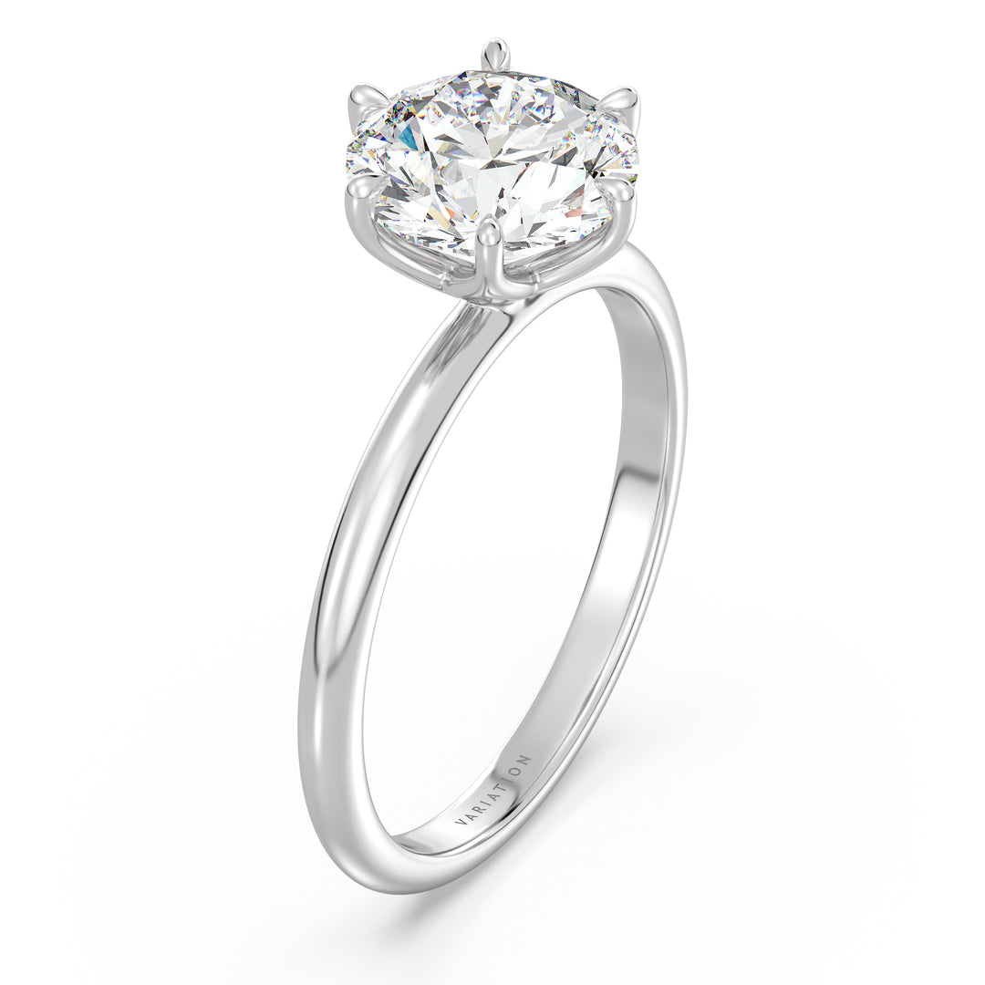 Round brilliant cut lab grown diamond solitaire ring in 18K white gold with an IGI certified diamond and timeless solitaire design.