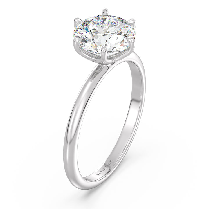 Round brilliant cut lab grown diamond solitaire ring in 18K white gold with an IGI certified diamond and timeless solitaire design.
