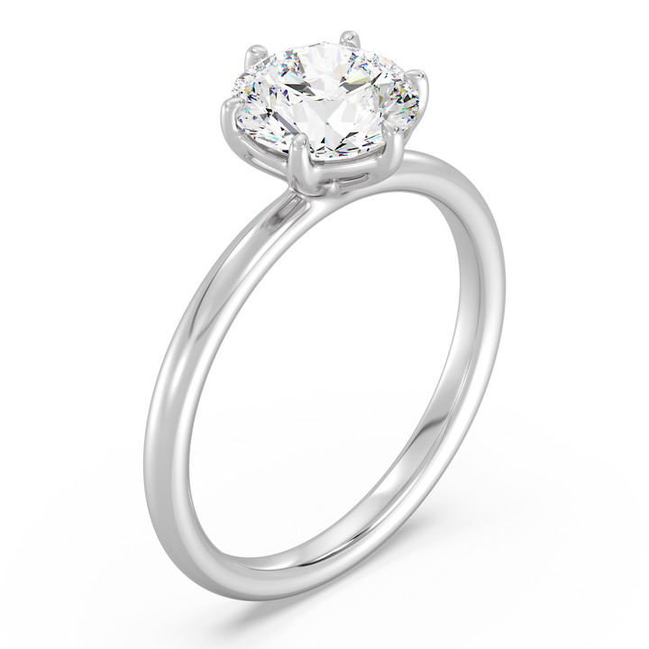 Round brilliant cut lab grown diamond solitaire ring in 18K white gold with an IGI certified diamond and classic solitaire design.