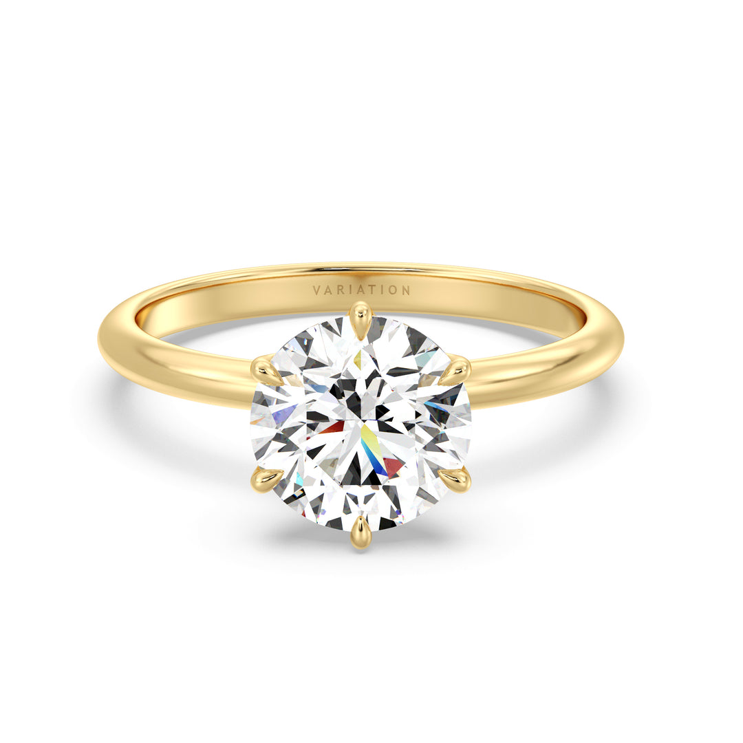 Round brilliant cut lab grown diamond solitaire ring in 18K yellow gold featuring an IGI certified diamond in a 6-prong open basket setting.