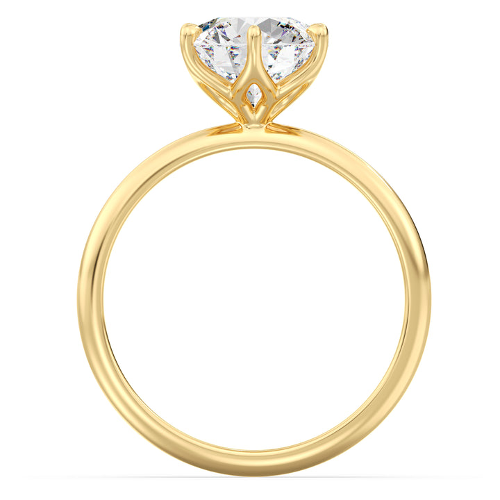 Round brilliant cut lab grown diamond ring in 18K yellow gold showcasing maximum brilliance and an open basket setting.