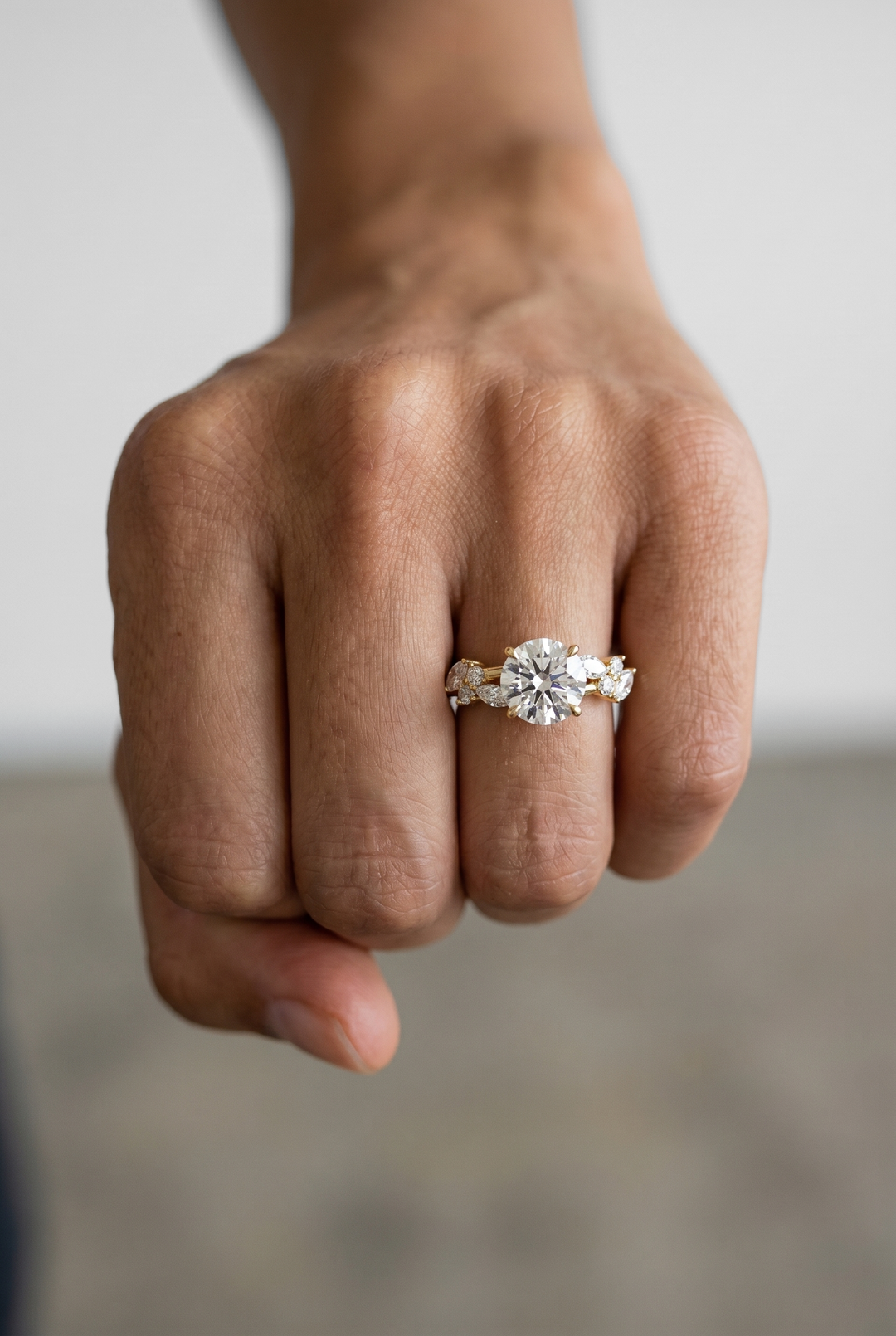 Round Brilliant Solitaire Ring with Marquise and Round Side Diamonds in 18K Yellow Gold