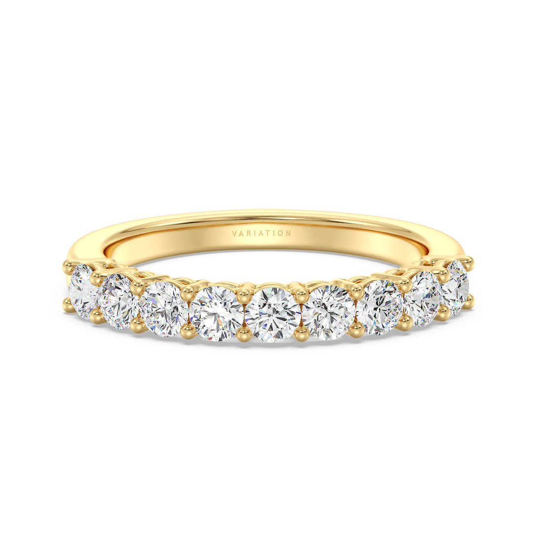 Elegant round brilliant lab grown diamond wedding band in 18K yellow gold with nine sparkling diamonds and timeless design.