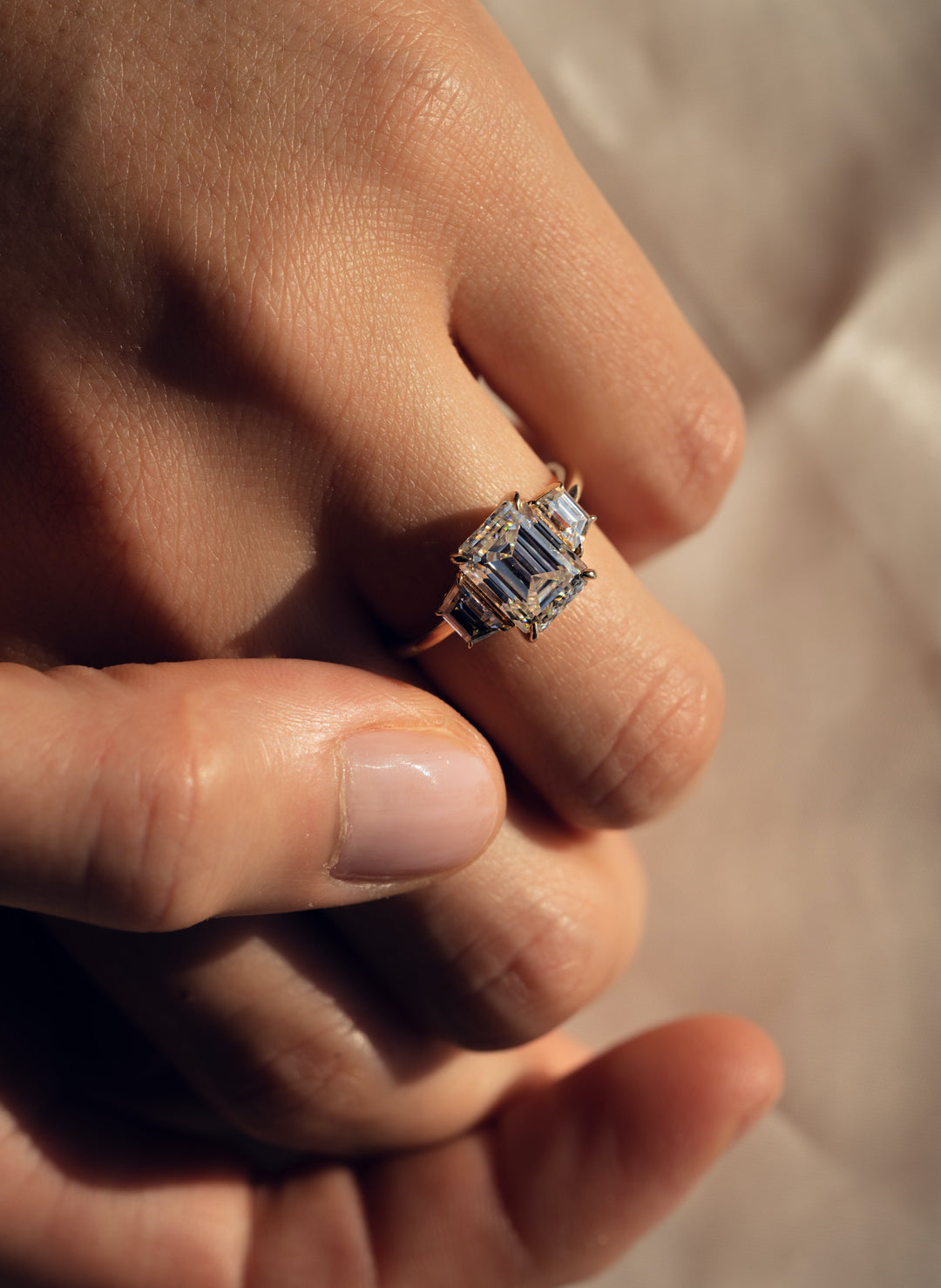 0.66 CT Emerald Cut Three Stone Moissanite Engagement Ring